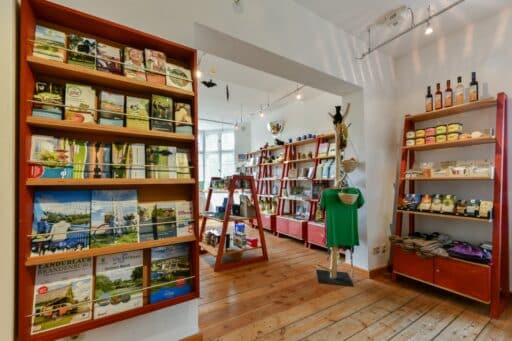 The Lenzen Castle store has shelves with regional products and flyers.