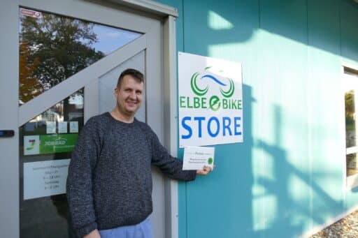 Michael Pietz from Elbe eBikes in front of his store