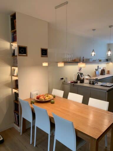 Kitchen and dining area with wall panel